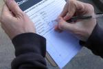 A hiker logs observations in the Downtown LA. field notebook.